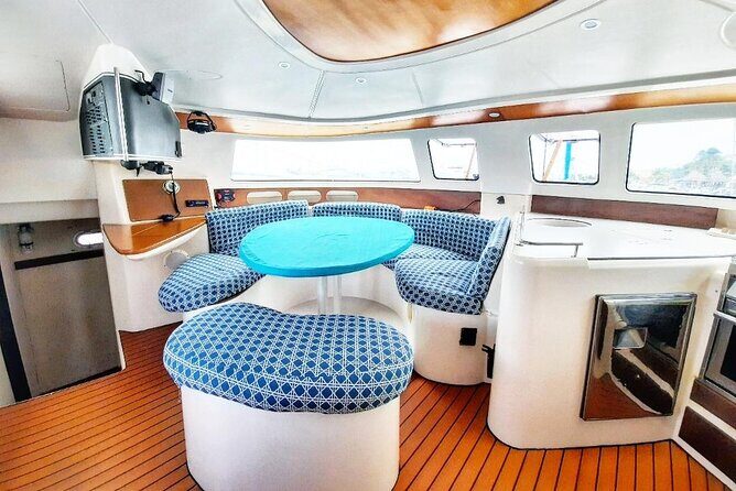 Catamaran Tour to Isla Mujeres Snorkeling with Buffet and Open Bar - Practical Details: What to Expect