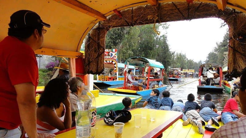 CDMX: Trajinera Party with Drinks, Music, and Tacos. - Authentic Mexican Culture & Fun