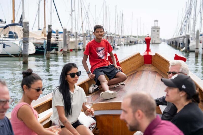 Check out Venice from a different angle: a scenic tour on a traditional boat. - The Experience in Detail