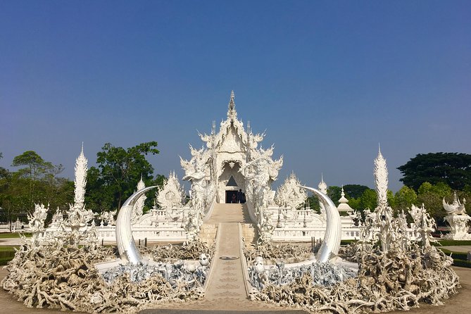 Chiang Mai-Chiang Rai: White Black Blue Temple Golden Triangle Boat Trip - Common Questions