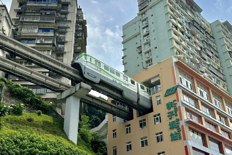 Chongqing Cuisine and City Highlights Private Tour - The Yangtze cableway and light rail through a building