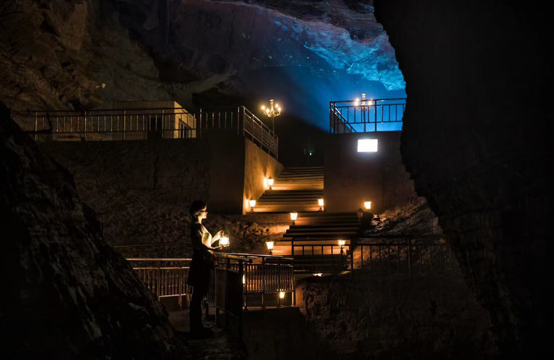 Chongqing Earths Core Adventure: Polar Rafting Cave Exploration Experience - Raft, then ferry along the blue-lit river