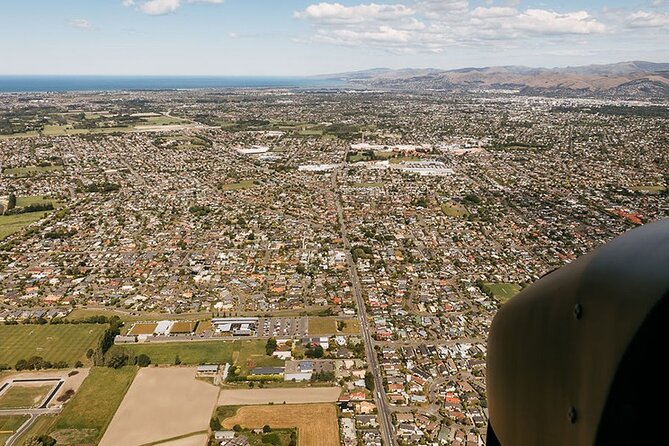 Christchurch City Scenic Flight - Pass by Sumner Beach (Cave Rock)