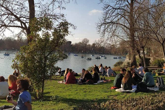 Cibeles Rooftop and Retiro Park Tour With Professional Guide - Exploring El Retiro Park
