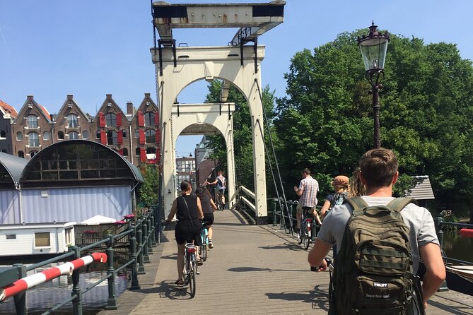 City Bike Tour Amsterdam, Exploring Amsterdams Must-See Sights - Positive Feedback on Tour Guides