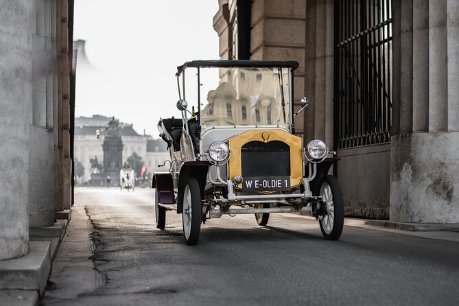 City Sightseeing Tour in an Electro Vintage Car (Up to 5 People) - Language Options