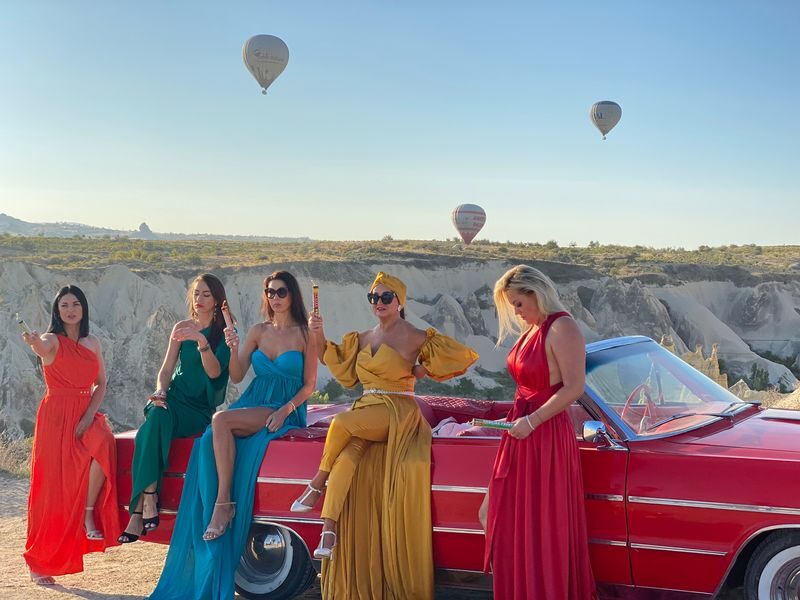 Classic Car Tour with Flying Dress Photoshoot in Cappadocia - Rose Valley at sunrise, with balloons as a possible bonus