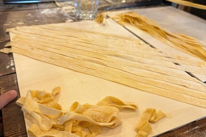 Cooking Class 2 Hour Vatican Fettucine and Tiramisù - Enjoying the Finished Dishes