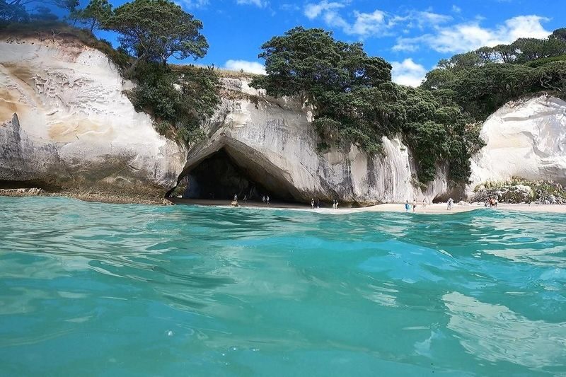 Coromandel Peninsula & Cathedral Cove - Scenic Day Trip from Auckland - Hot Water Beach: bring your sense of play