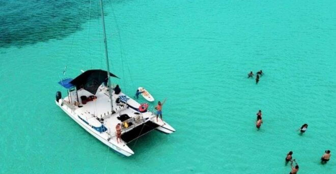 Cozumel: Private Catamaran Tour on Jolly Moon - Onboard Experience