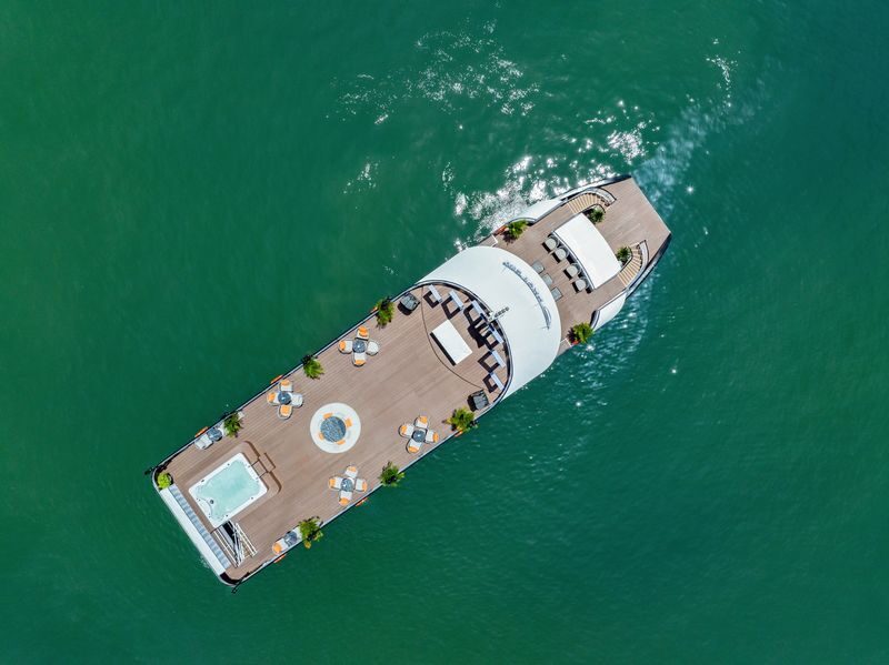 Cozy Bay Day Cruise: Ha Long Bay, Sung Sot, Ti Top - Luon Cave by paddle or bamboo boat