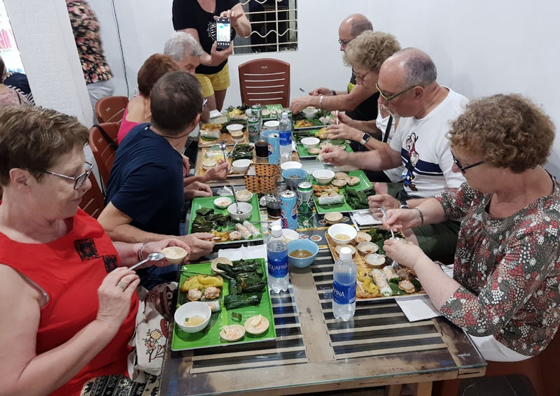 Culinary Night Cyclo Tour in Hue - Nem lui brings the table together