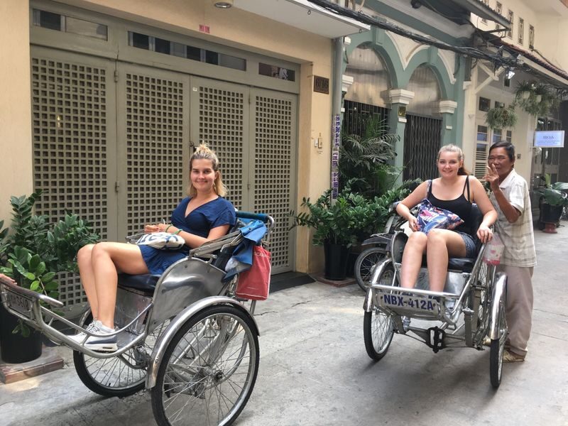 Cyclo Ride with Lunch or Dinner in Vietnamese Restaurant - A low seat in the middle of Saigon traffic