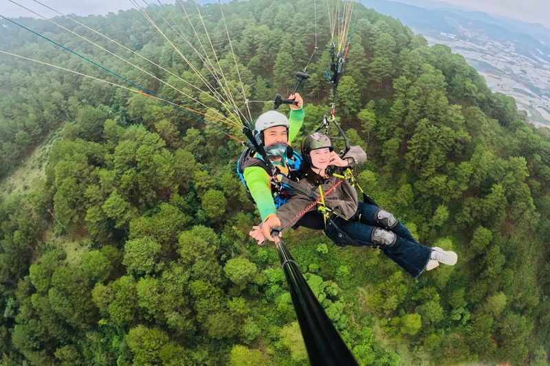 Da Lat Paragliding from Lang Biang Mountain - Ten to 15 minutes over Da Lat’s pine forests