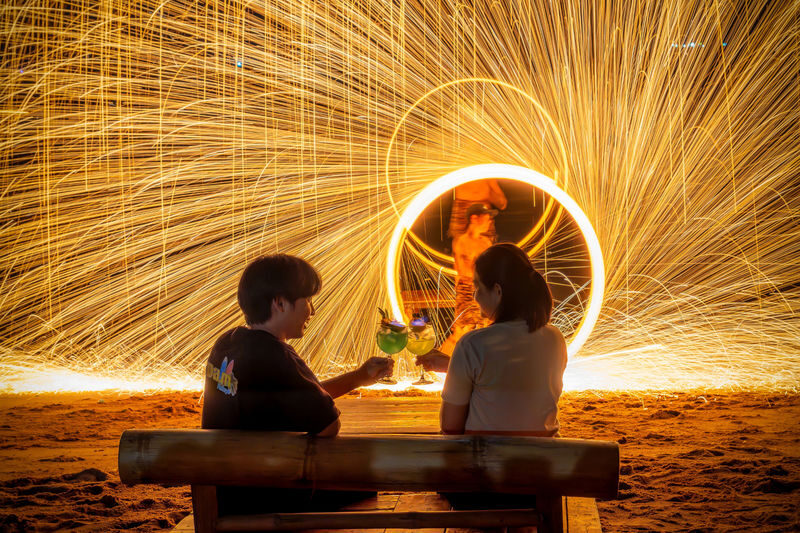 DAM Beach FIRESHOW PATTAYA - A beachfront table, then a ring of fire
