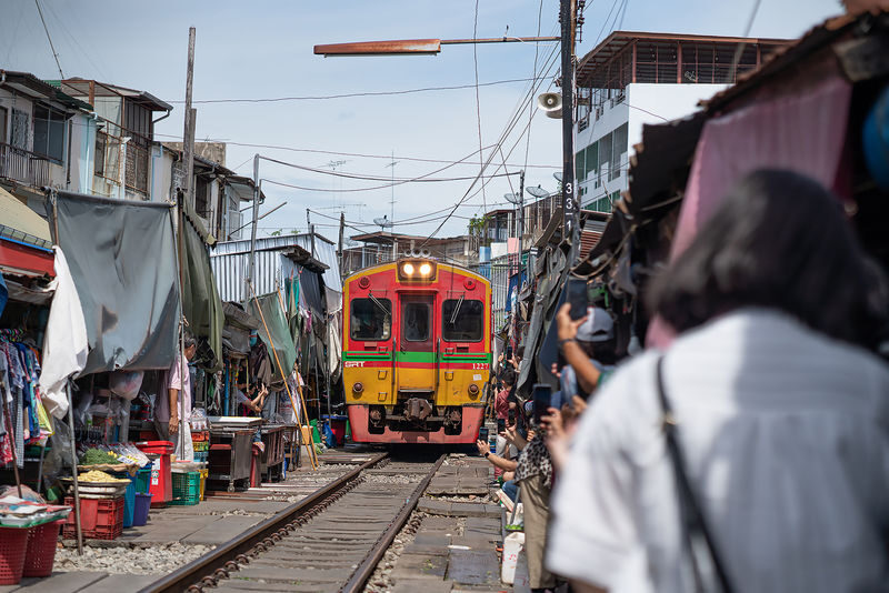 Damnoen Saduak, Maeklong Train, Grand Palace and Sunset View Hidden - 07:00 pickup and the road to Maeklong