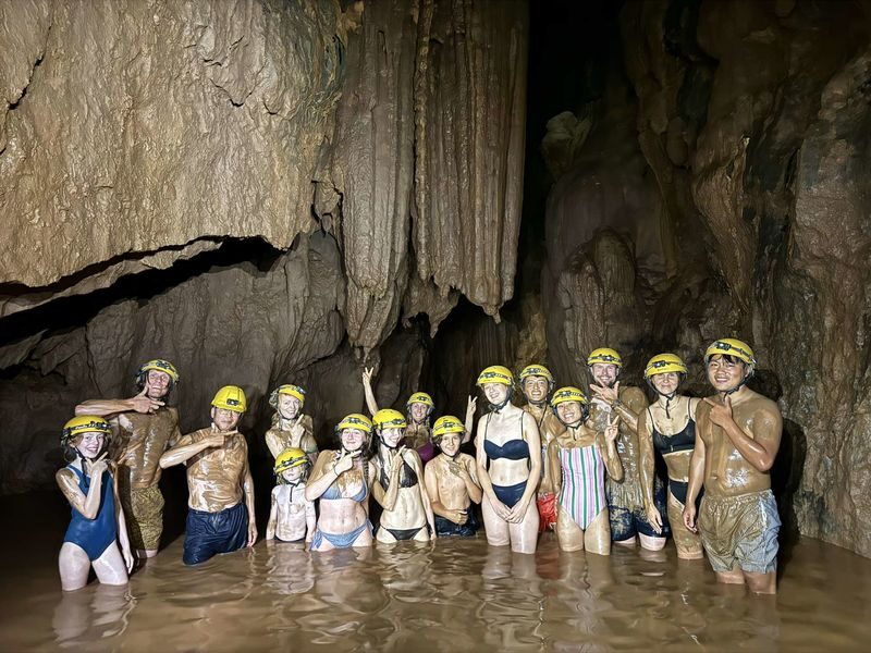 Dark Cave with Mud Bath Experience and Phong Nha Cave Day Tour - Phong Nha Cave trades mud for a quiet river ride
