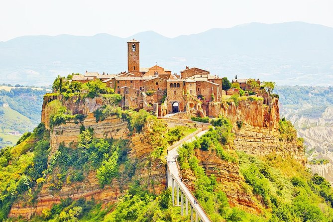 Day Private Tour From Rome to the Dying Town of Bagnoregio and Orvieto - Itinerary Overview