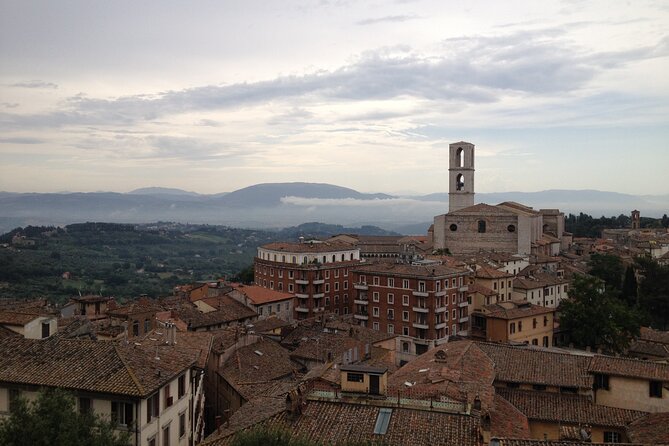 Day Trip: Pasta Cooking Lab With Lunch & Perugia Guided Tour - Booking and Pricing