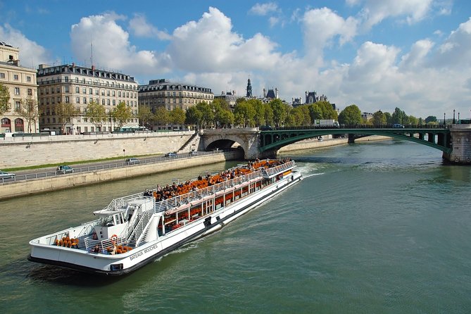 Day Trip to Paris With Eiffel Tower, River Cruise, Louvre - The Sum Up