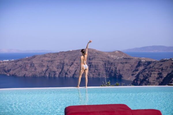 Daybed Relaxation With Infinity Pool Use With Caldera Views - Common Questions
