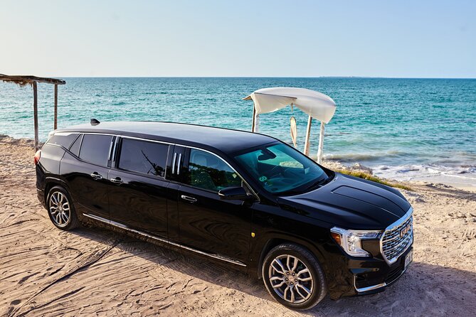 Deluxe GMC Limousine From CUN Airport to CanCUN Hotel Zone - Meeting and Pickup