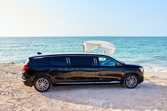 Deluxe GMC Limousine From CUN Airport to CanCUN Hotel Zone - Bottled Water