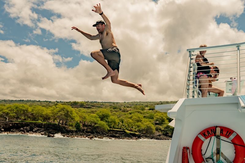 Deluxe Snorkeling & Dolphin Watching Experience in the Big Island - Snorkeling at a sanctuary reached only by boat