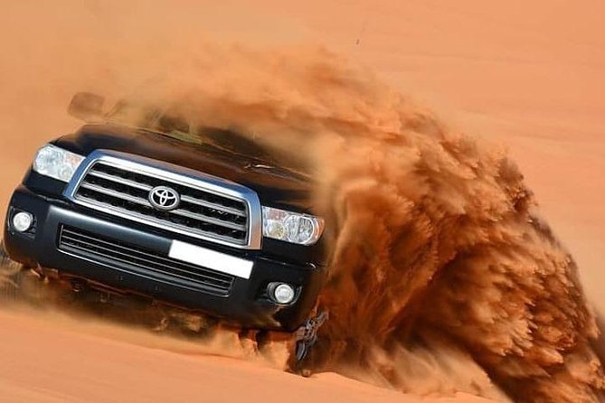 Desert Safari 4x4 Drive With Camel Ride,Belly DanceTanura & Fire Show BBQ Dinner - Desert Safari Experience