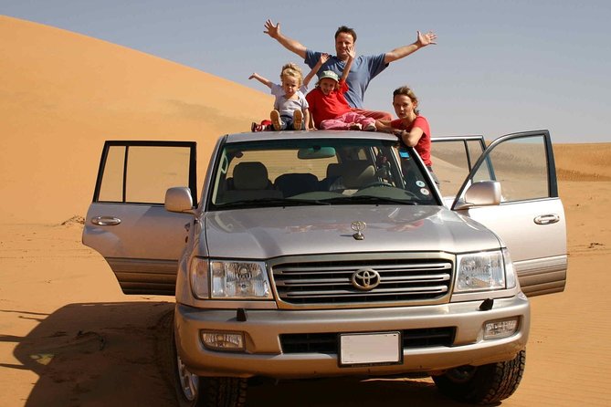 Desert Safari 4x4 Drive With Camel Ride,Belly DanceTanura & Fire Show BBQ Dinner - Barbecue Dinner at Desert Camp