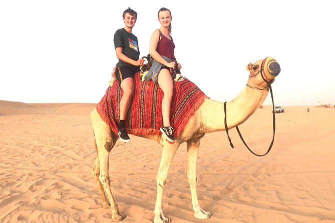 Desert Safari 4x4 Drive With Camel Ride,Belly DanceTanura & Fire Show BBQ Dinner - Cancellation Policy