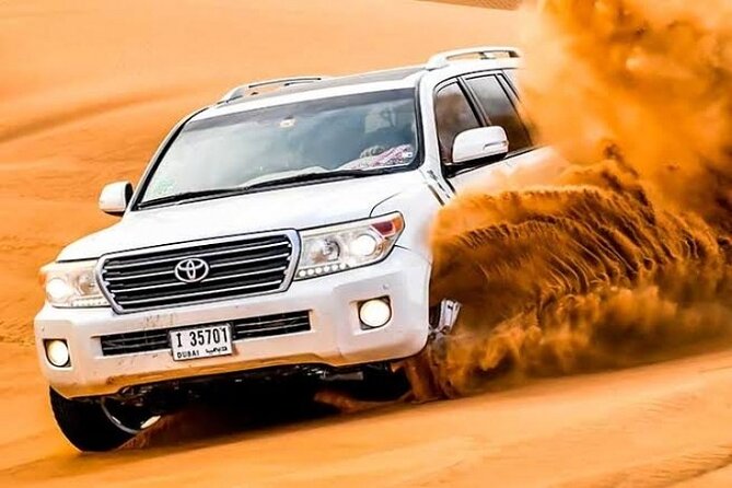 Desert Safari 4x4 Dunes, Camel Riding, BBQ & Live Shows - Indulging in a BBQ Feast