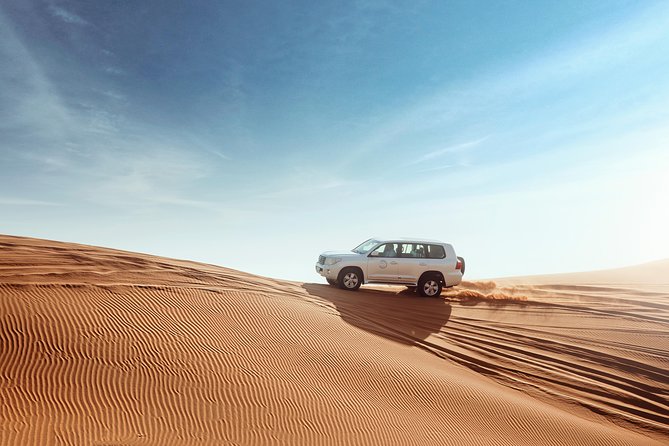 Desert Safari Dubai With Dune Bashing, Sandboarding, Camel Ride, 5 Shows, Dinner - The Sum Up