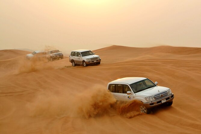 Desert Safari Experience With Dune Bashing and Dinner in Dubai - Traditional Desert Camp Activities