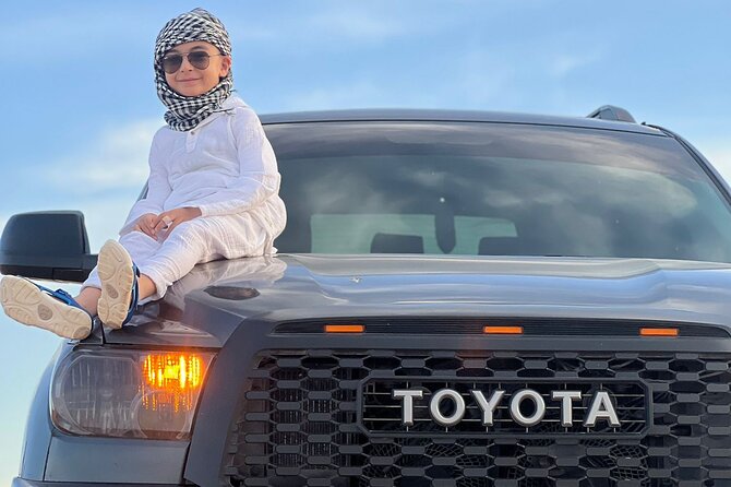 Desert Safari With 4x4 Dune Bashing Camel Ride Sand Boarding - Indulge in Traditional Arabian Cuisine