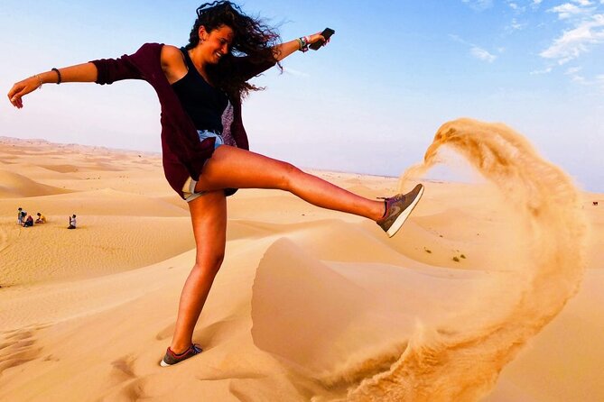 Desert Safari With BBQ Dinner, Quad Bike and Camel Ride Experience From Dubai - Indulge in a BBQ Dinner Under the Stars