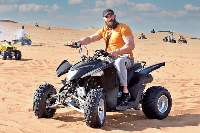 Desert Thrills: Dune Bashing, 30-min Quad Biking, Dances & BBQ - Camel Ride and Entertainment