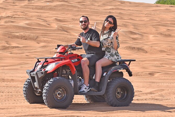 Desert Thrills: Dune Bashing, 30-min Quad Biking, Dances & BBQ - Meeting and Pickup