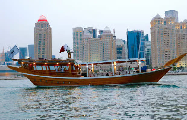 Dhow Harbour & Corniche Sunset Cruise - A city drive before the dhow