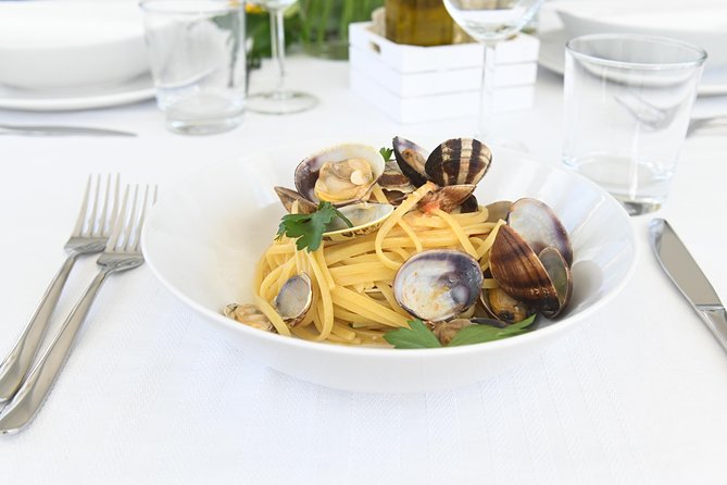 Dining Experience at a Locals Home in Livorno With Show Cooking - Overview of Experience