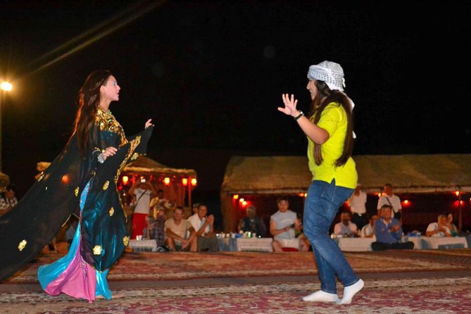 Dinner in Dubai Desert With Camel Ride, BBQ Dinner and Belly Dance - The Sum Up