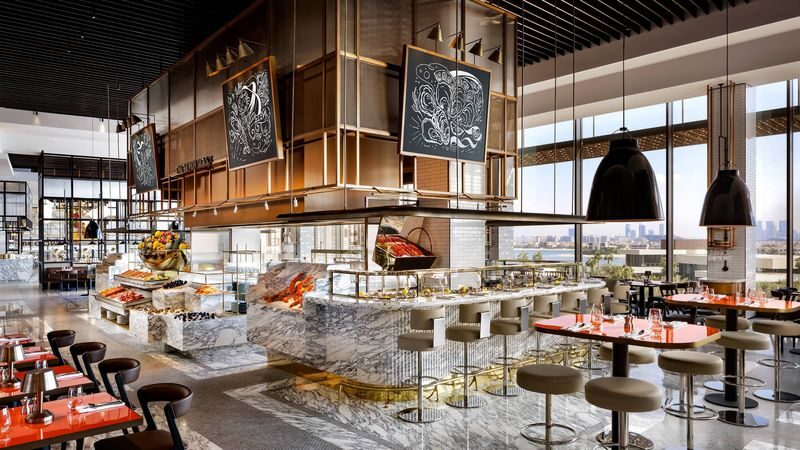 Dinner or Breakfast Buffet at Gastronomy Atlantis The Royal - A hotel buffet with a special-occasion setting