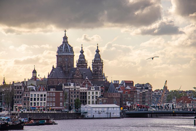 Discover Amsterdam'S Most Photogenic Spots With a Local - Pricing and Booking