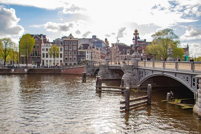 Discover Amsterdam'S Most Photogenic Spots With a Local - Reservation and Flexibility