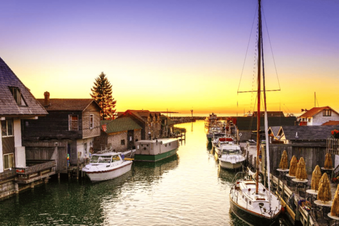 Discover Lake Michigan: Scenic Driving Tour - Relaxing at Frankfort Beach