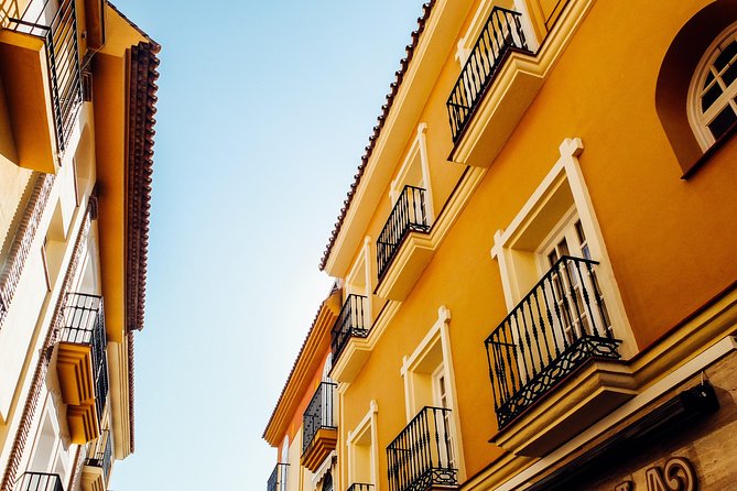 Discover Malaga'S Most Photogenic Spots With a Local - Booking and Pricing Details
