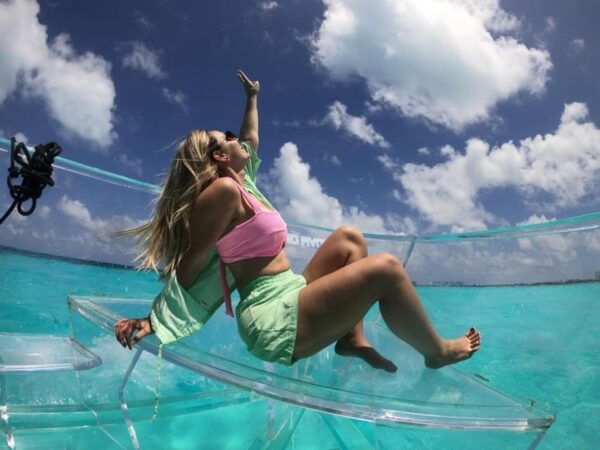 Discover the Beautiful Isla Mujeres Transparent Boat Tour - Vibrant Marine Life and Tropical Fish