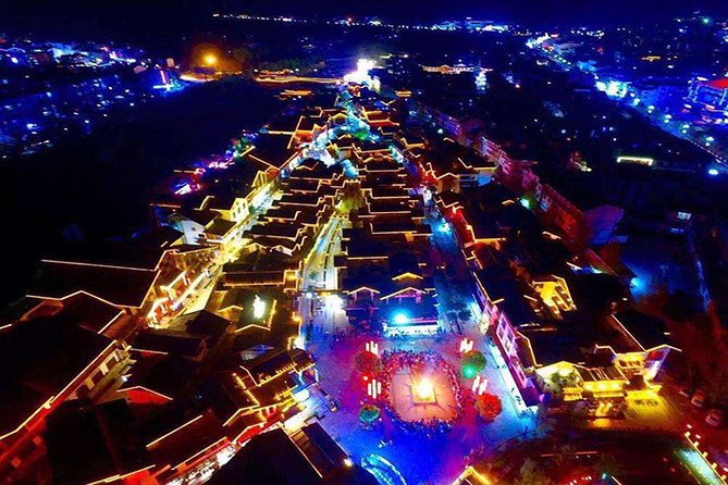 Discovery Day Tour to Yellow Dragon Cave,Baofeng Lake and Xibu Street - Inclusions