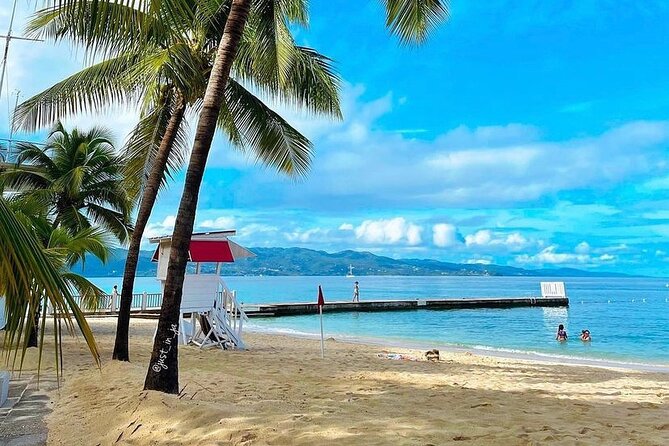 Doctors Cave Beach and Shopping With Transportation in Montego Bay - Beach Experience at Doctors Cave Beach