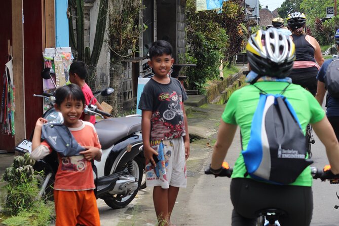 Downhill Cycling Tour Ubud Through Jungle and Rice Terrace - Heading Downhill From the Top of the Hills